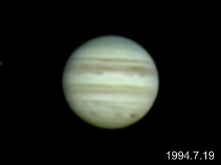木星とシューメーカー・レビー第9彗星の衝突跡の写真