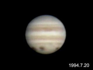 木星とシューメーカー・レビー第9彗星の衝突跡の写真